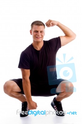 Man doing sitting exercise Stock Photo