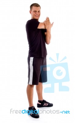 Man doing Stretching exercise Stock Photo