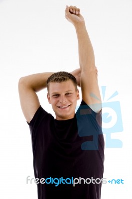 Man doing Stretching exercise Stock Photo