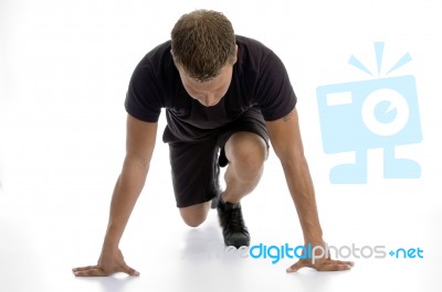 Man Doing Stretching Exercise Stock Photo