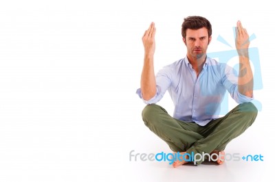 Man Doing Yoga Stock Photo