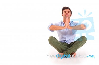 Man Doing Yoga Stock Photo