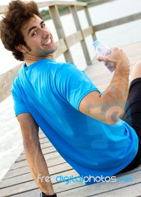 Man Drinking Water After Sport Activities Stock Photo