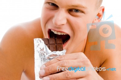 Man Eating Chocolate Stock Photo