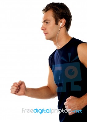 Man enjoying music in jogging Stock Photo