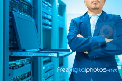 Man Fix Server Network In Data Center Room Stock Photo