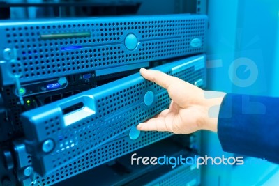 Man Fix Server Network In Data Center Room Stock Photo