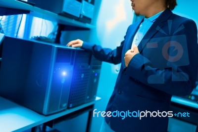 Man Fix Server Network In Data Center Room Stock Photo