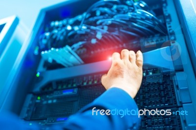 Man Fix Server Network In Data Center Room Stock Photo