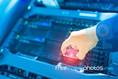 Man Fix Server Network In Data Center Room Stock Photo