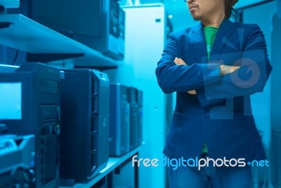 Man Fix Server Network In Data Center Room Stock Photo