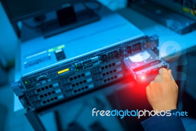 Man Fix Server Network In Data Center Room Stock Photo