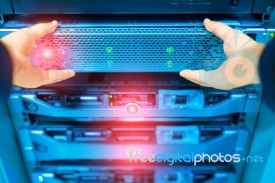 Man Fix Server Network In Data Center Room Stock Photo