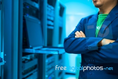 Man Fix Server Network In Data Center Room Stock Photo