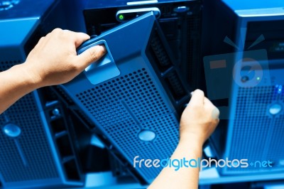 Man Fix Server Network In Data Center Room Stock Photo