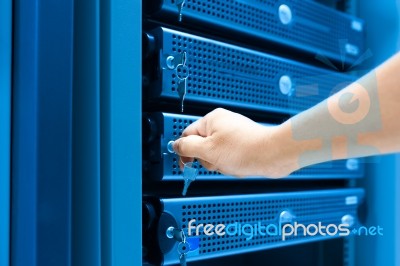 Man Fix Server Network In Data Center Room Stock Photo