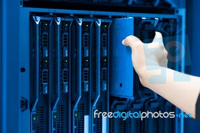 Man Fix Server Network In Data Center Room Stock Photo