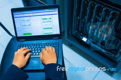 Man Fix Server Network In Data Center Room Stock Photo