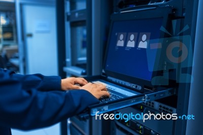 Man Fix Server Network In Data Center Room Stock Photo