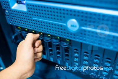 Man Fix Server Network In Data Center Room Stock Photo