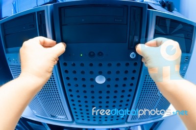 Man Fix Server Network In Data Center Room Stock Photo