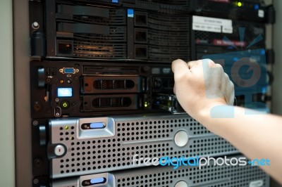 Man Fix Server Network In Data Center Room Stock Photo