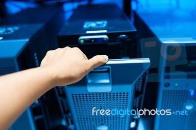 Man Fix Server Network In Data Center Room Stock Photo