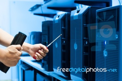 Man Fix Server Network In Data Center Room Stock Photo