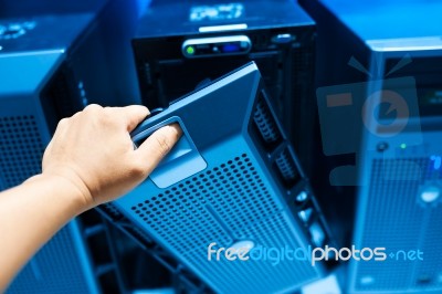 Man Fix Server Network In Data Center Room Stock Photo