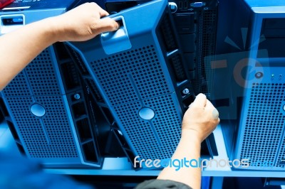 Man Fix Server Network In Data Center Room Stock Photo