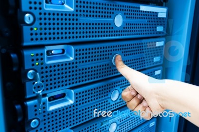 Man Fix Server Network In Data Center Room Stock Photo