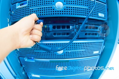 Man Fix Server Network In Data Center Room Stock Photo