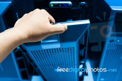 Man Fix Server Network In Data Center Room Stock Photo