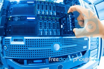 Man Fix Server Network In Data Center Room Stock Photo