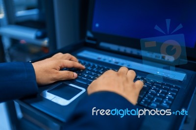 Man Fix Server Network In Data Center Room Stock Photo