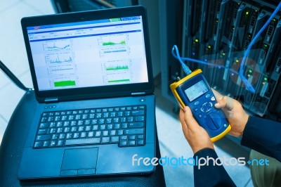 Man Fix Server Network In Data Center Room Stock Photo