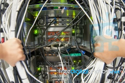 Man Fix Server Network In Data Center Room Stock Photo