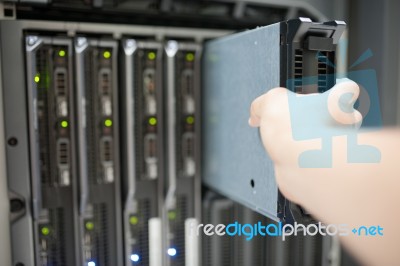 Man Fix Server Network In Data Center Room Stock Photo