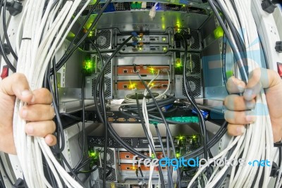 Man Fix Server Network In Data Center Room Stock Photo