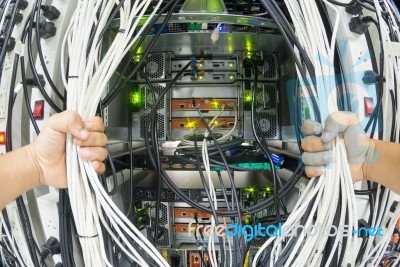 Man Fix Server Network In Data Center Room Stock Photo