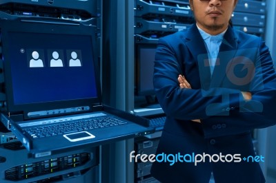 Man Fix Server Network In Data Center Room Stock Photo