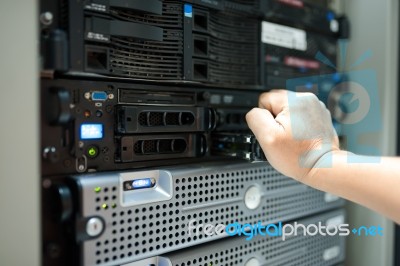 Man Fix Server Network In Data Center Room Stock Photo