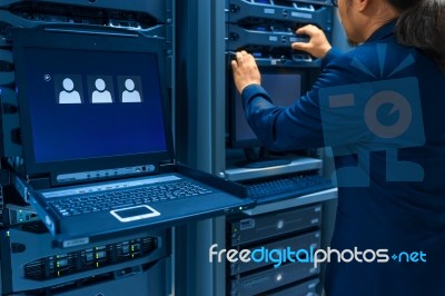 Man Fix Server Network In Data Center Room Stock Photo