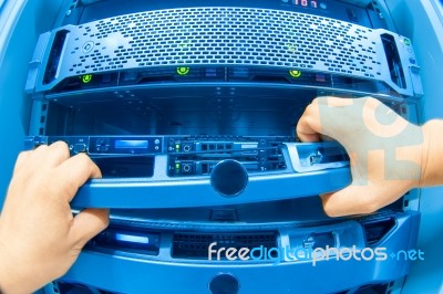 Man Fix Server Network In Data Center Room Stock Photo