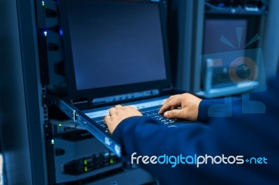 Man Fix Server Network In Data Center Room Stock Photo