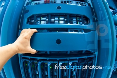 Man Fix Server Network In Data Center Room Stock Photo