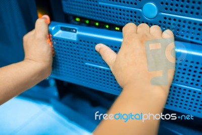 Man Fix Server Network In Data Center Room Stock Photo