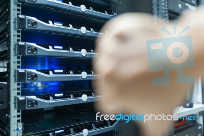 Man Fix Server Network In Data Center Room Stock Photo