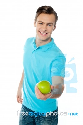 Man Giving Apple Stock Photo