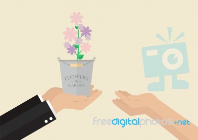 Man Giving Flowers To A Woman Stock Image